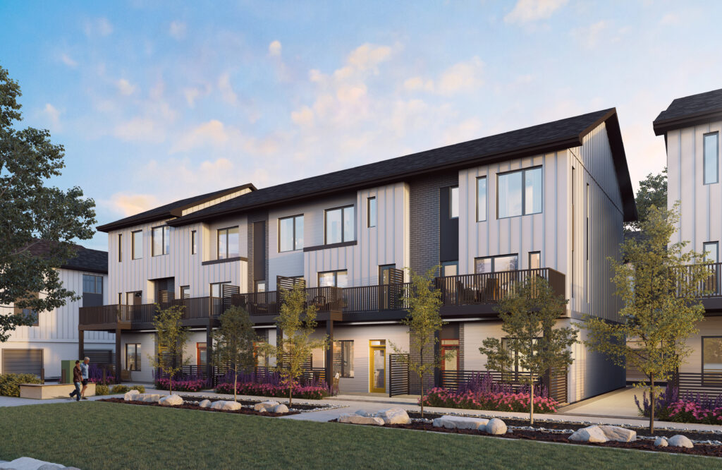 Landscaped green space and interconnected pathways surrounding Rhythm townhomes at Taza Park, SW Calgary