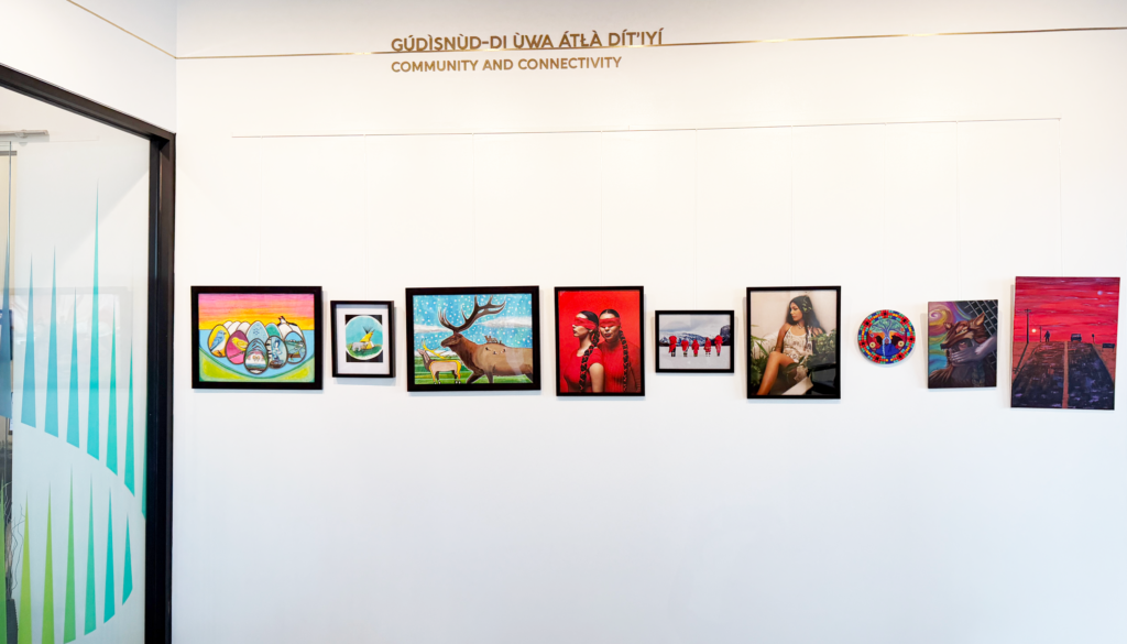Art wall at the Taza Park Sales & Marketing Centre featuring 9 unique works from 3 different Tsuut'ina Nation artists.
