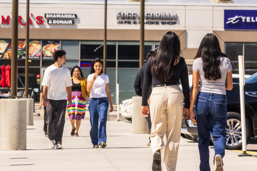 People walking through The Shops at Buffalo Run